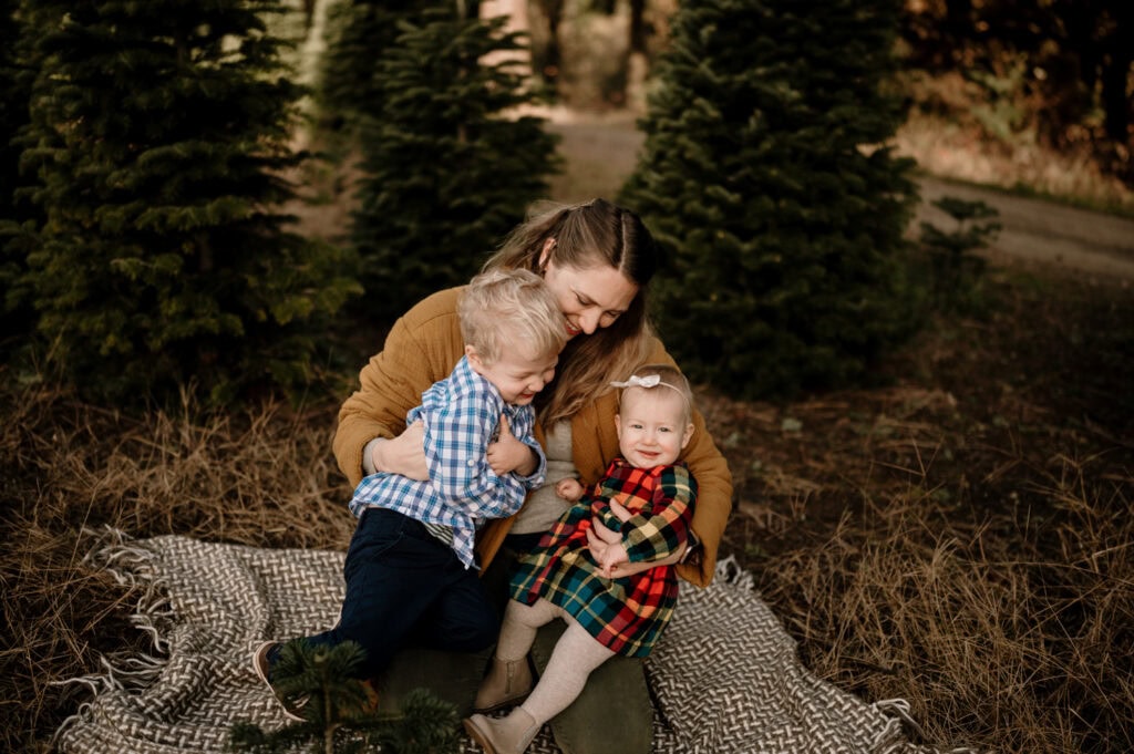 family at Christmas tree farm in Portland