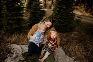 family at Christmas tree farm in Portland