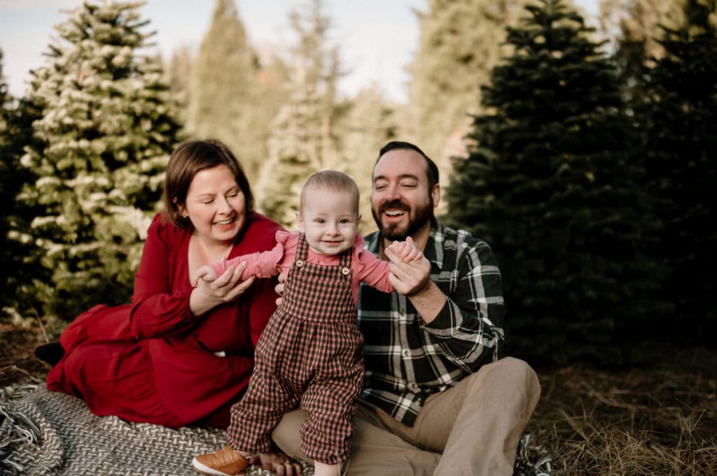 family at Christmas tree farm in Portland