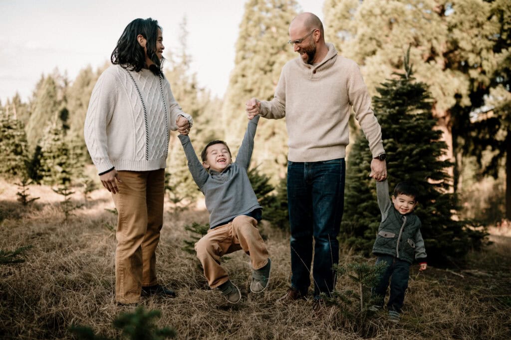 family at Christmas tree farm in Portland