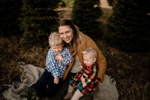 family at Christmas tree farm in Portland