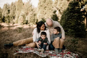 family at Christmas tree farm in Portland