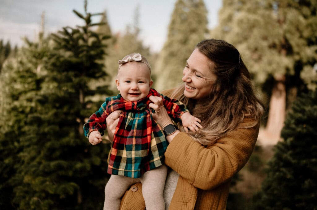 family at Christmas tree farm in Portland