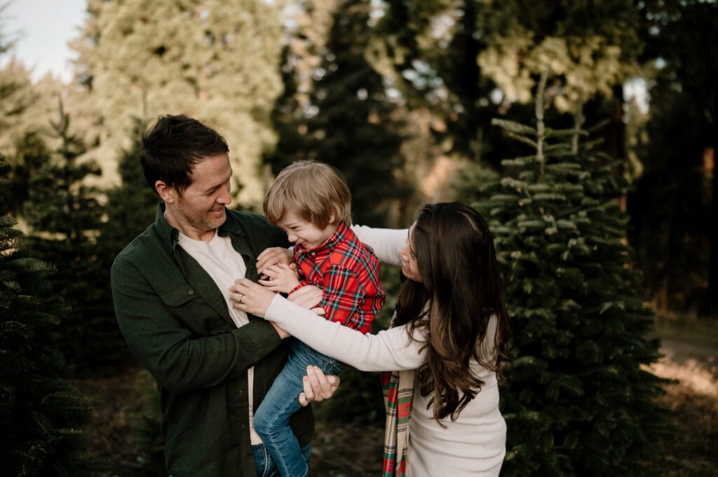 family at Christmas tree farm in Portland