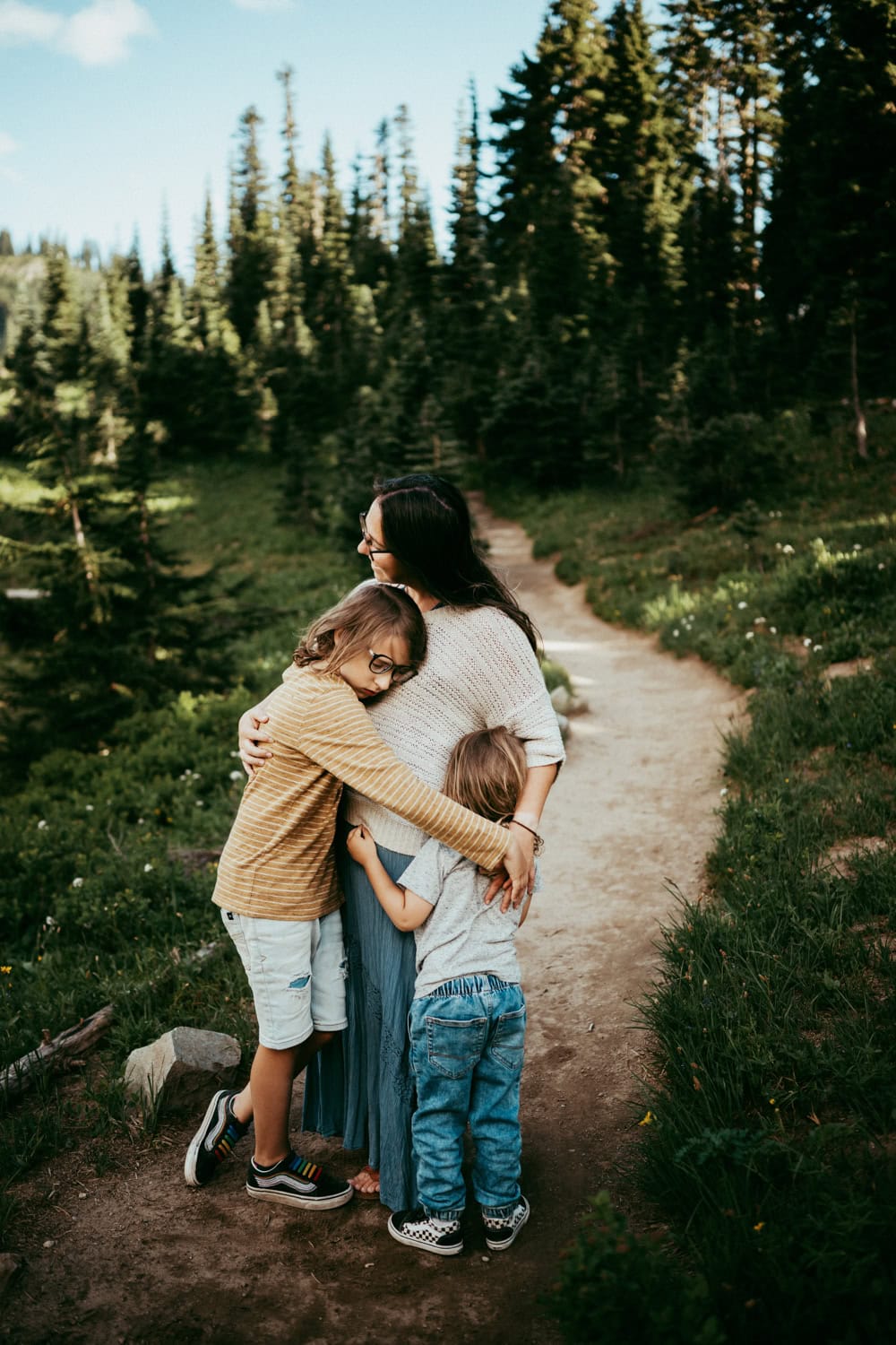 mother embracing children at during Mt Rainier family photos