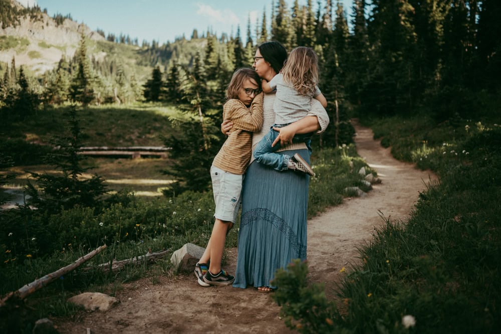 mother and children cuddling during mt rainier family photos