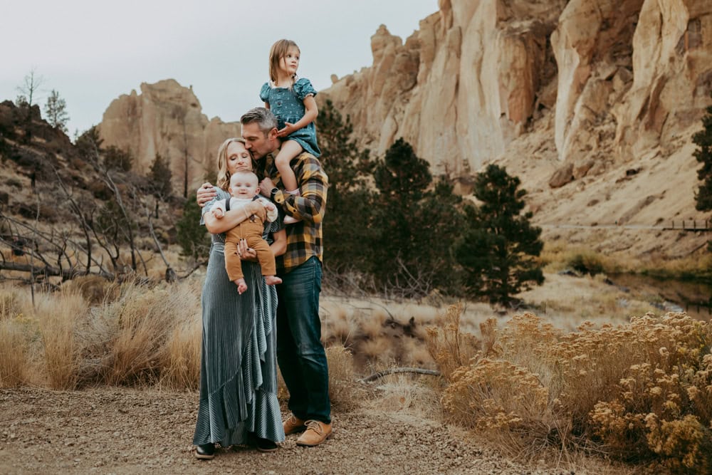 family cuddling and having fun at Smith Rock