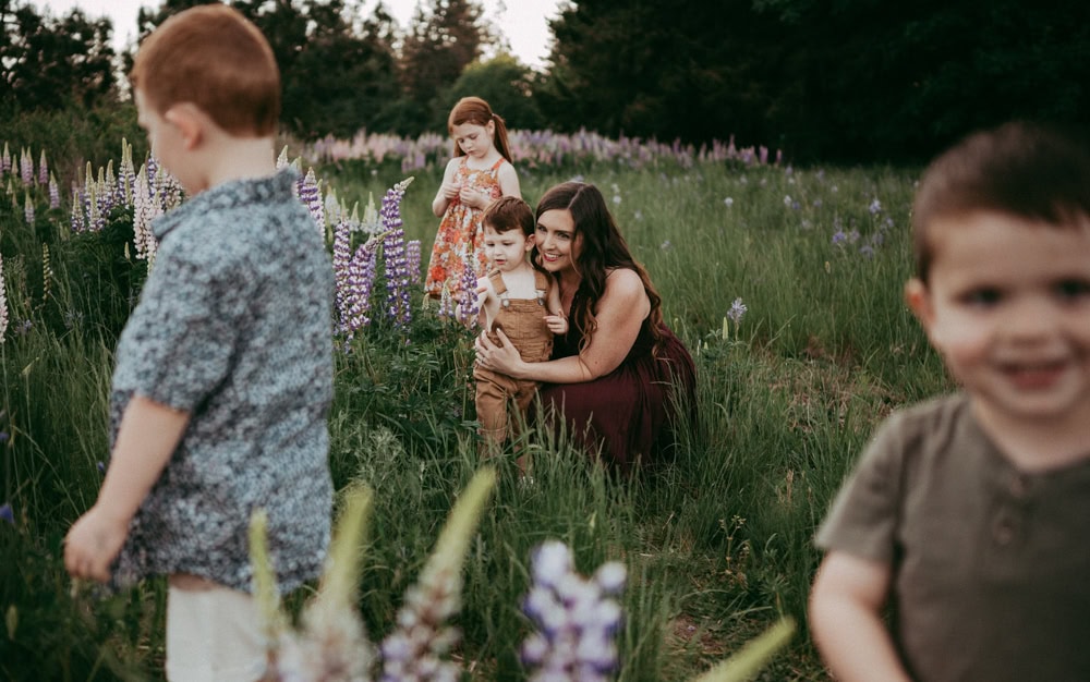 mother and her children at outdoor location as an example of what to wear for family photos