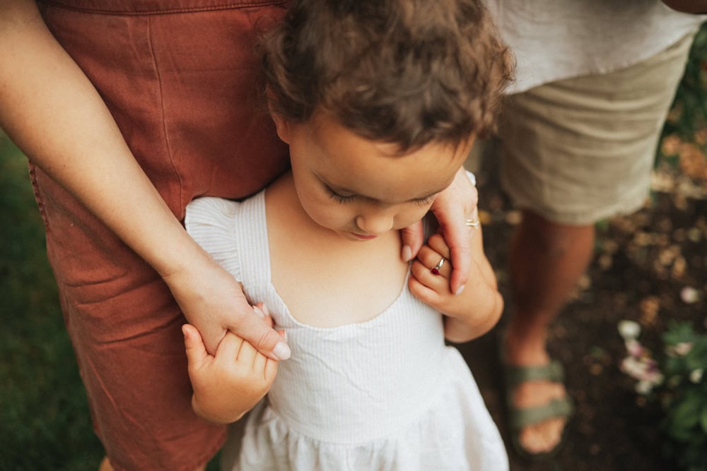 mom and daughter holding hands