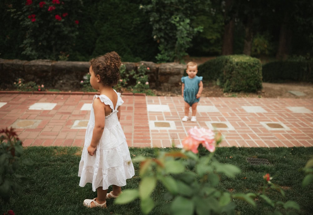 sisters walking around the international rose test garden